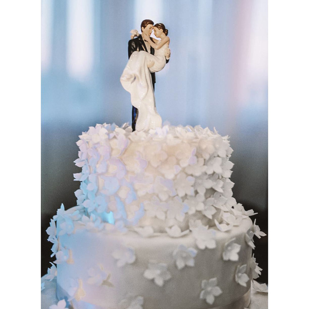 Groom Holding Bride Traditional Cake Topper Figurine - Wedding Collectibles