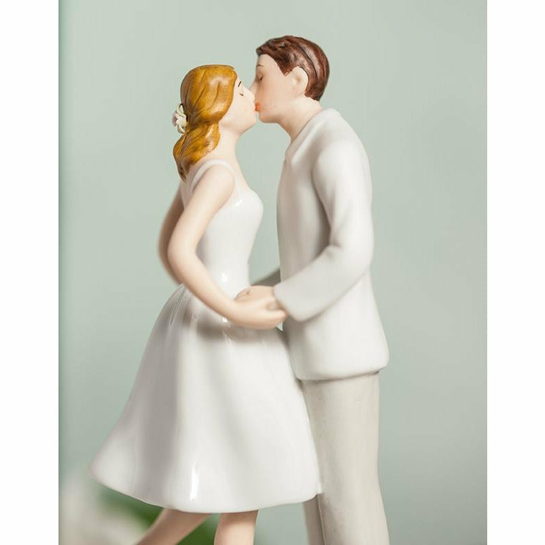 Leg Pop Kissing Couple Wedding Cake Topper - Wedding Collectibles